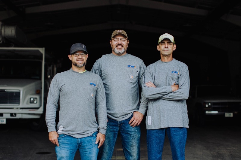 Three natural gas utility workers.